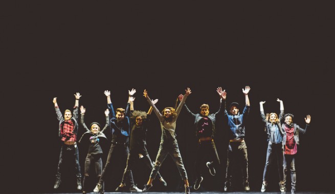 actors jumping on stage