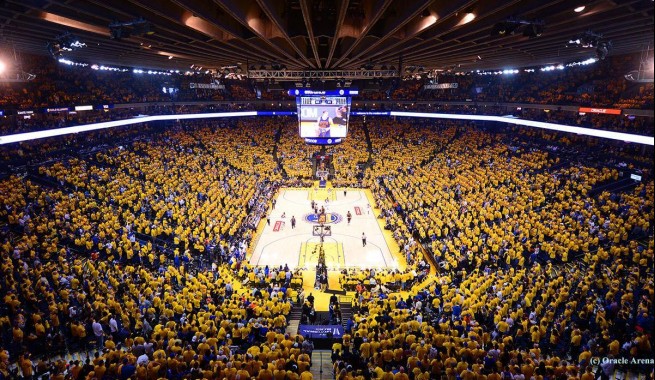 golden state warriors basketball game. The stadium in full with fans in teams golden yellow