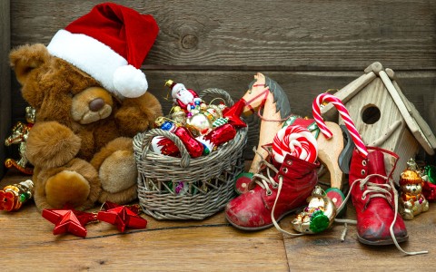 Christmas decor and toys piled on the floor