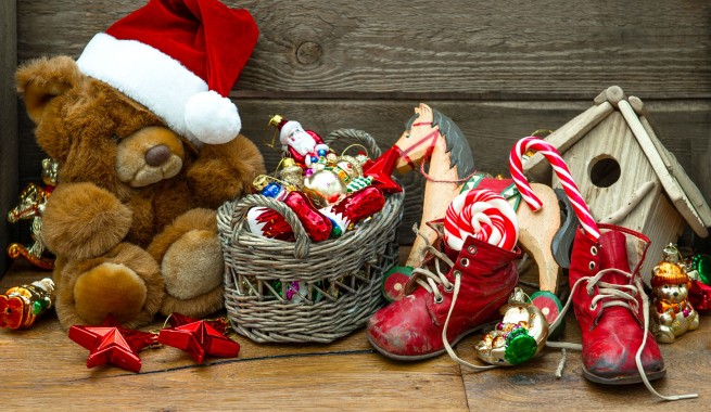 Christmas decor and toys piled on the floor