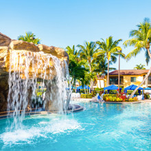 a large pool with a waterfall