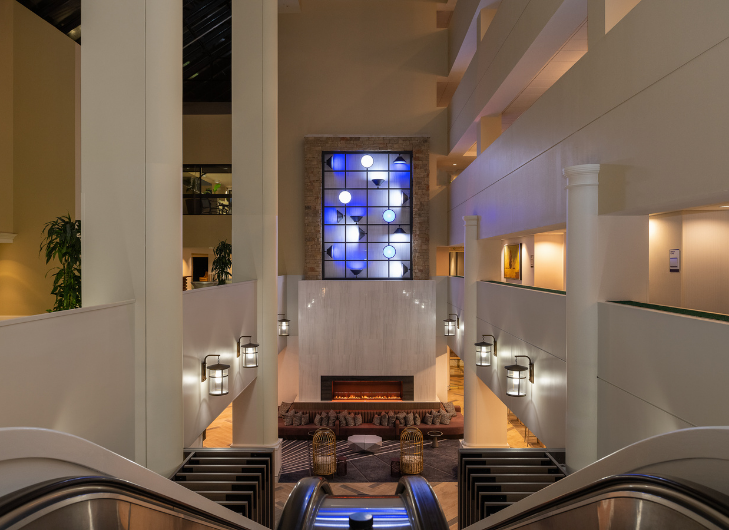 view of escalator in hotel lobby