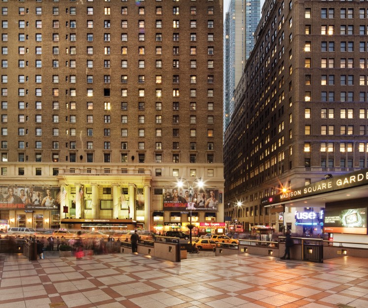 Hotel Penn exterior next to Madison Square Garden