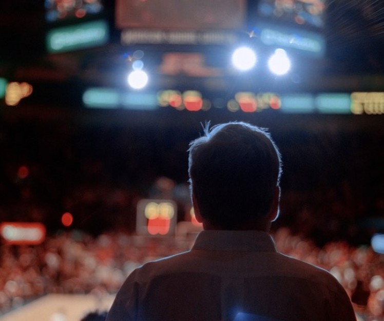 man on a stage at Madison Square Garden