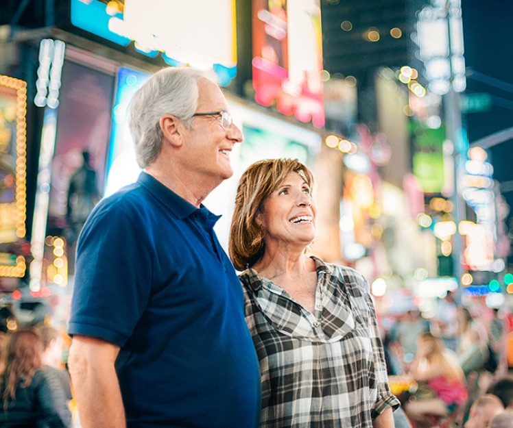 elderly couple in times square