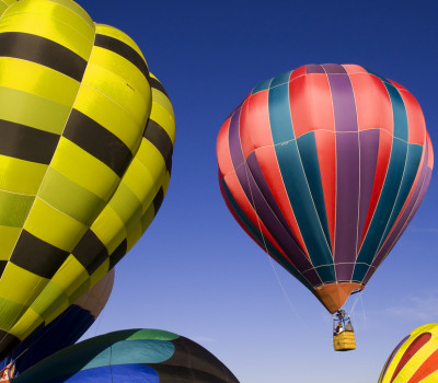 Brightly Colored Hot Air Balloons Float Over Park City Utah