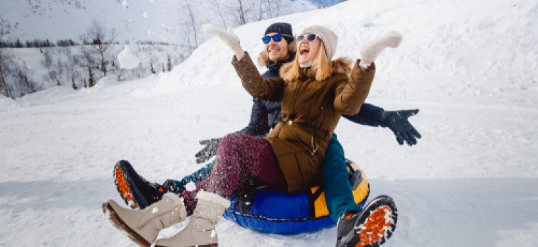 couple tubing in snow