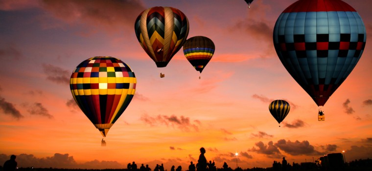 hot air balloons at sunset
