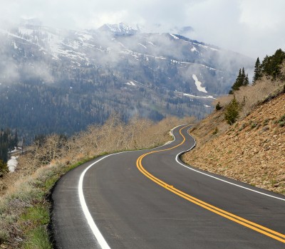 roads along the mountain and fog