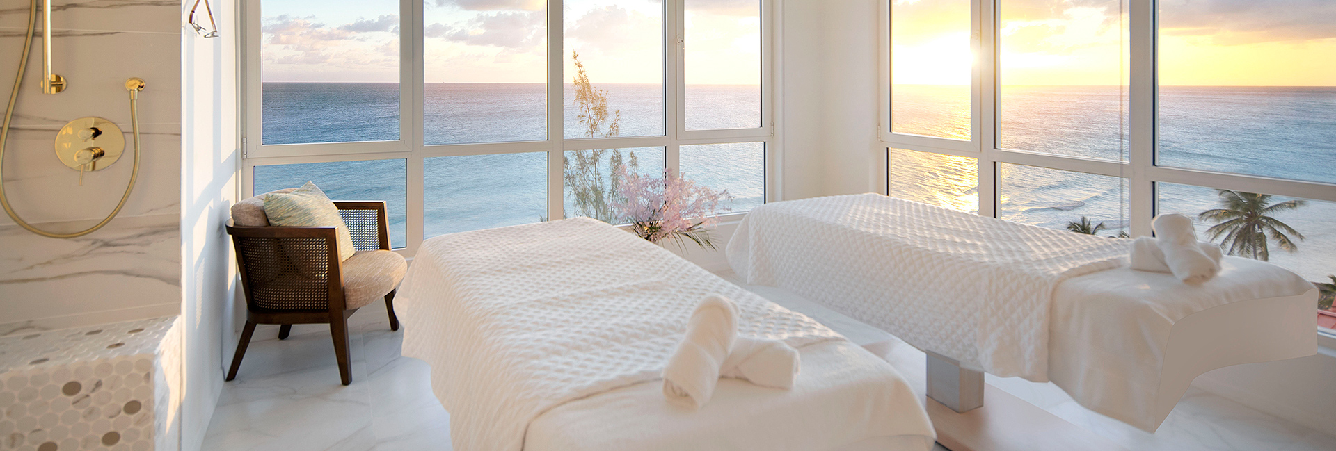 spa room over looking the ocean at sunset