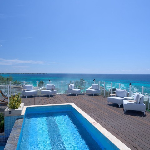 pool on terrace overlooking ocean