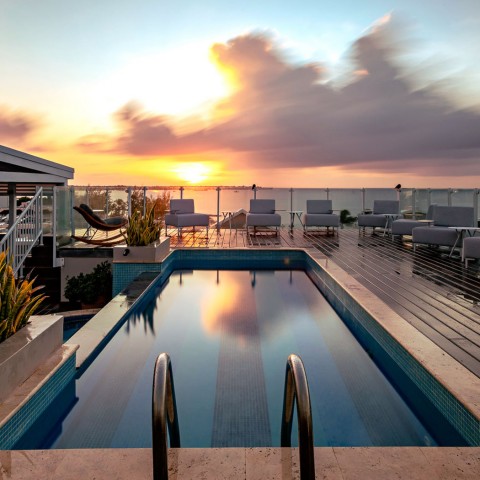sunset over pool with terrace