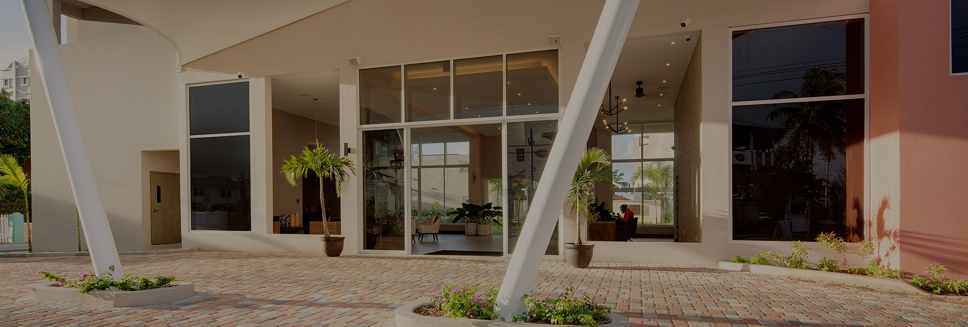 exterior of building with floor to ceiling windows