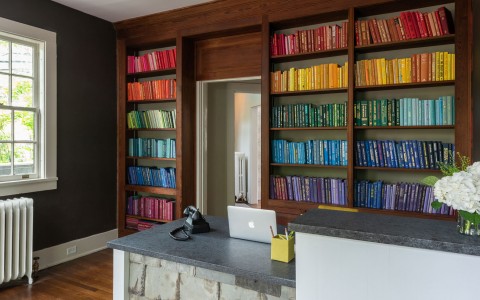 front desk area with bookshelf