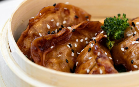 Close up of chinese dumplings with sesame seeds