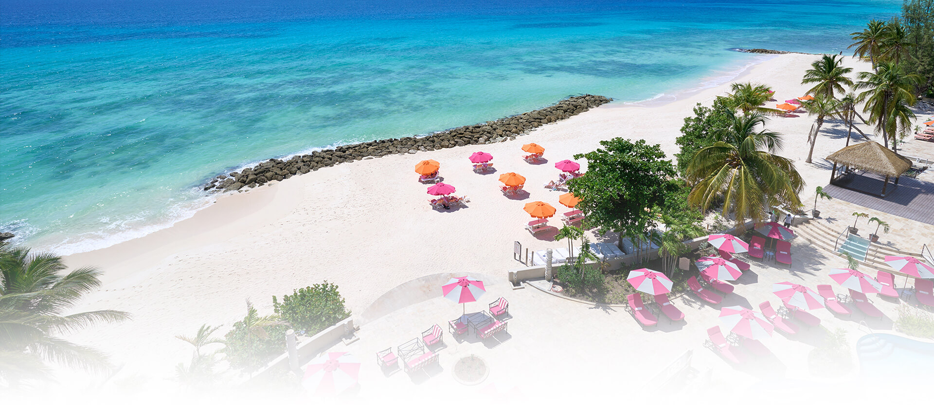 o2 beach club chairs and umbrellas on the beach