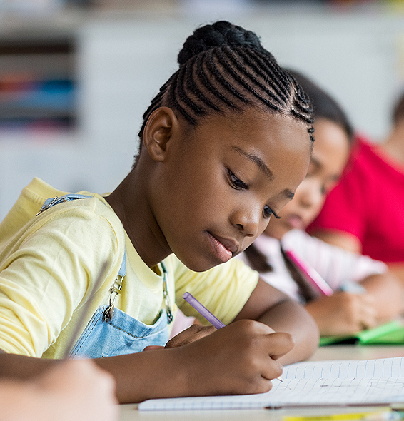 girl writing in notebook