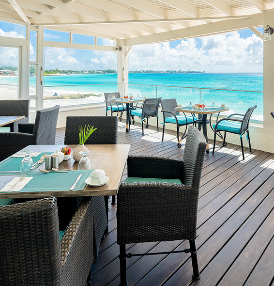 black chairs on deck in restaurant set up