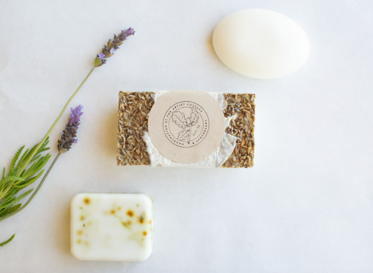 above image of a natural body soaps and a plant by the side