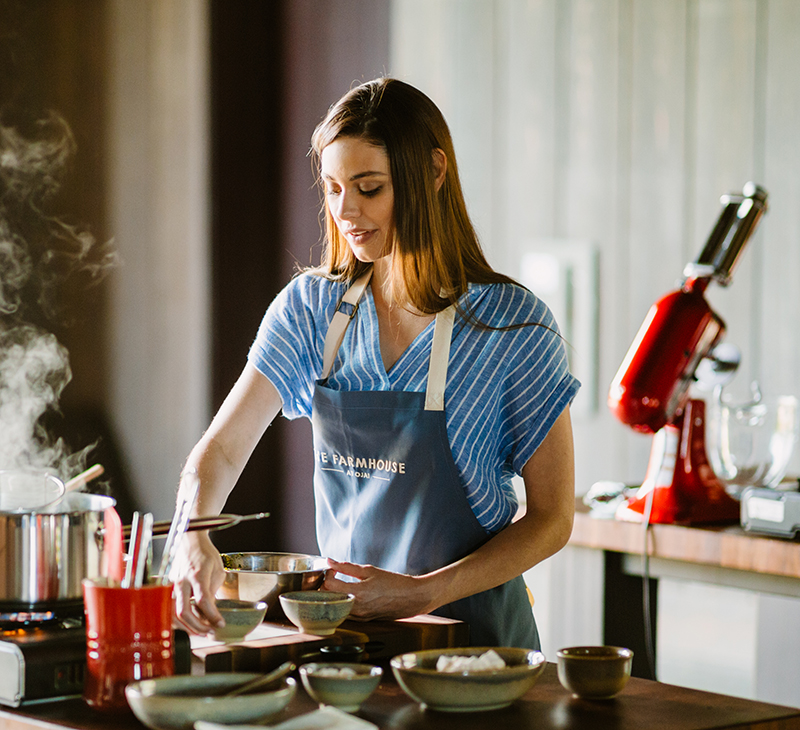 woman cooking with apron on 
