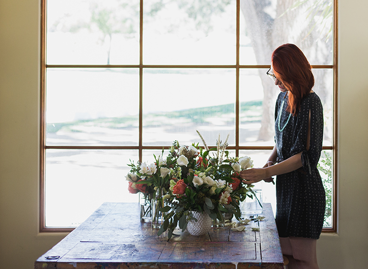 Floral arrangement being made