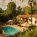 small image of an aerial view of property with a pool