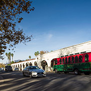 view of a street with a bus and cars 