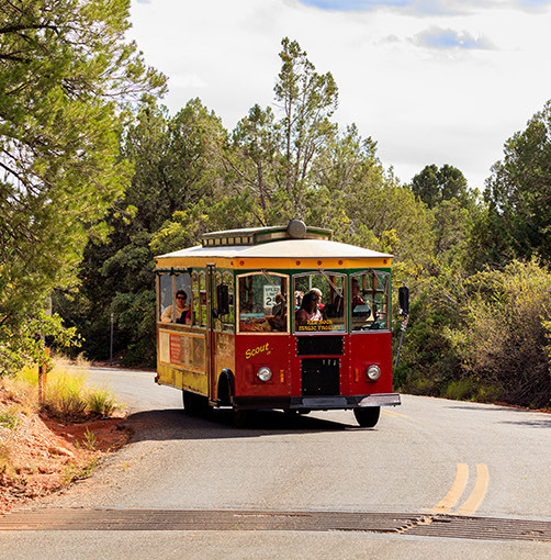 people riding the red rock magic trolley