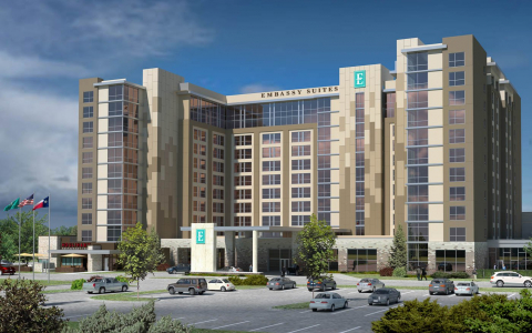 Rendering of Embassy Suites hotel exterior with Houlihans restaurant attached