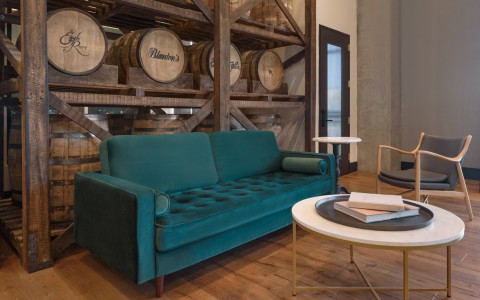 barrels and seating area with sofa