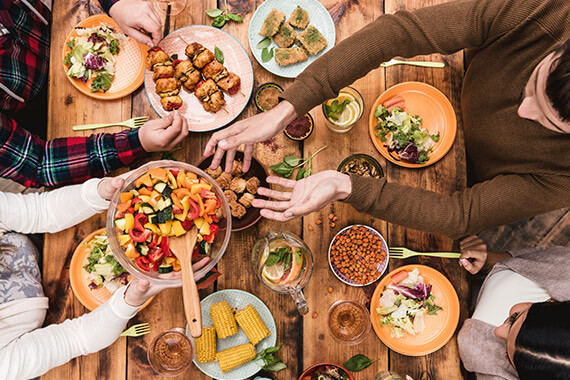 aerial view of people sharing food at the table