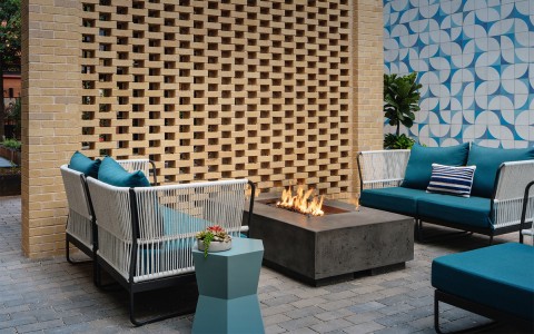 courtyard and firepit with outdoor seating 