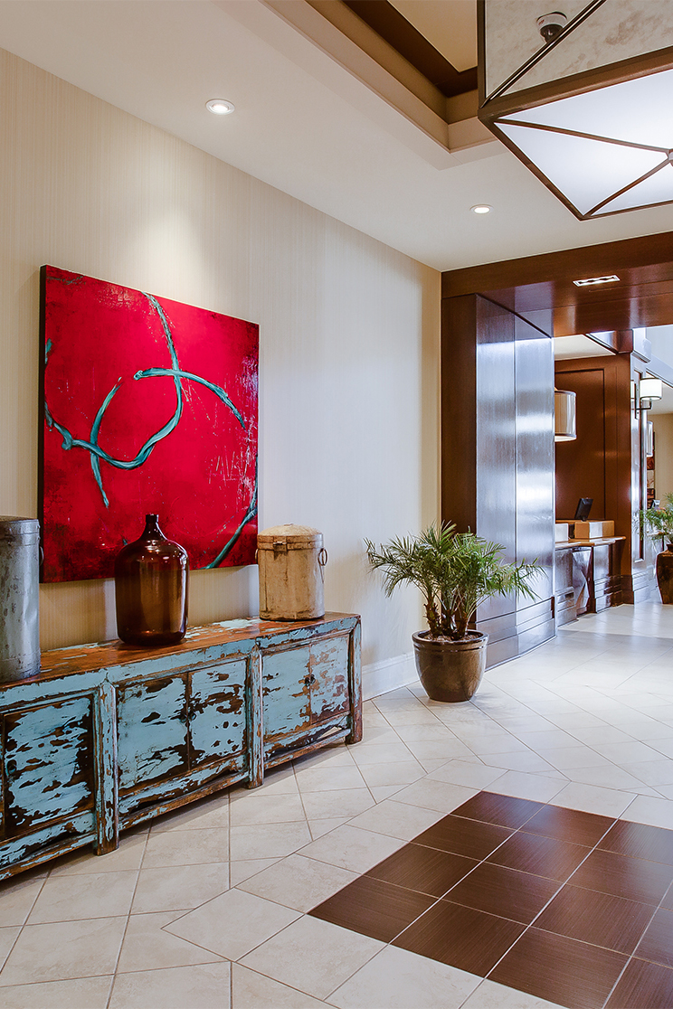 lobby area with a red painting