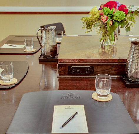 Conference Room Table Setting with notepad and pen