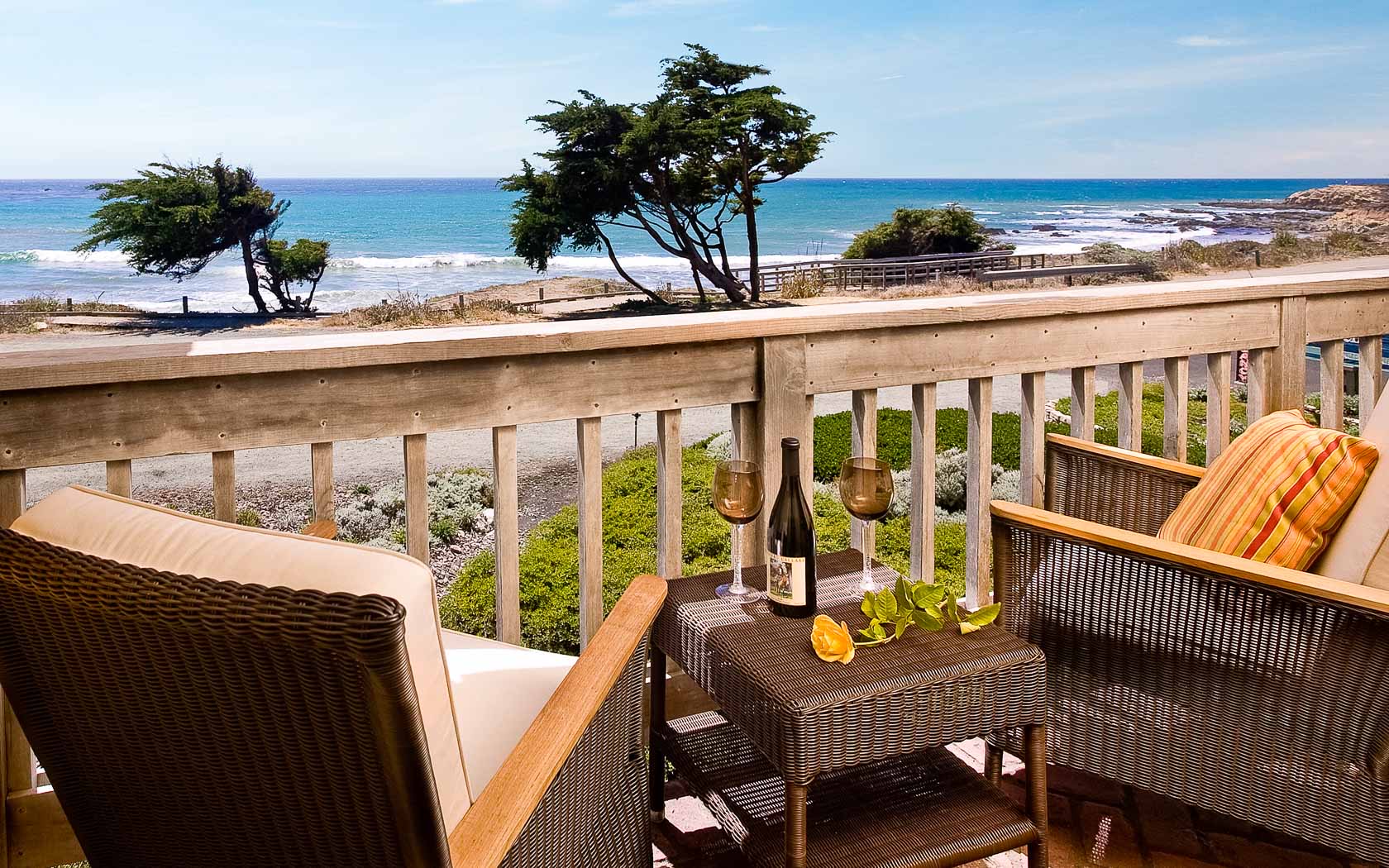 Wine and chairs on the balcony with ocean views