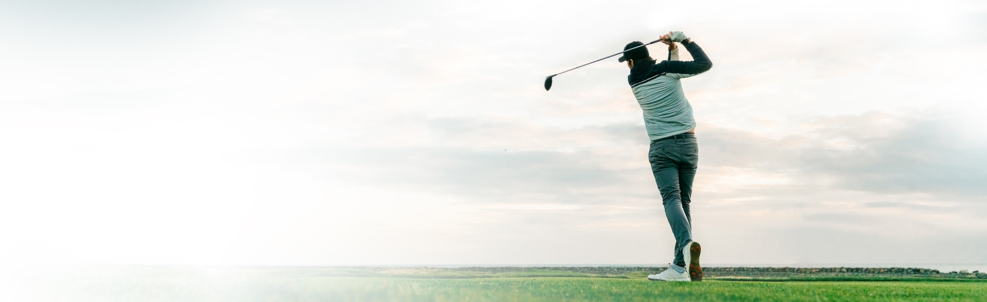 Man playing golf