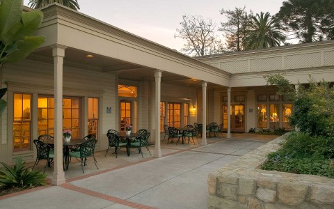 the patio area at the hotel at dusk