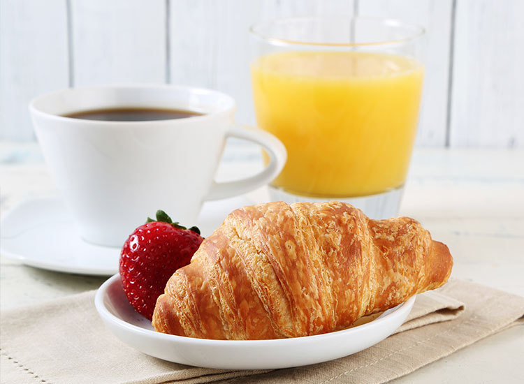 coffee with orange juice and pastry