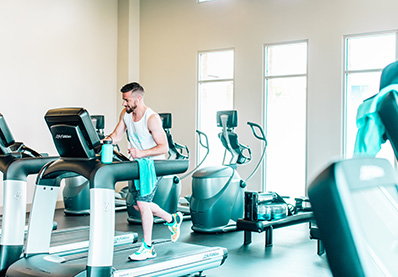 man working out in the treadmill