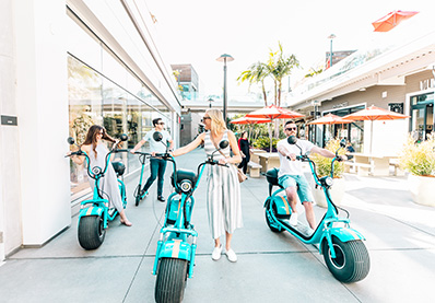 group of friends riding motor bikes