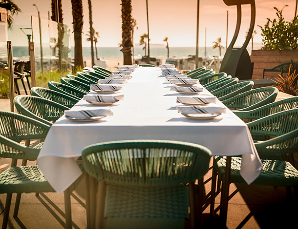 Long table set up beachside
