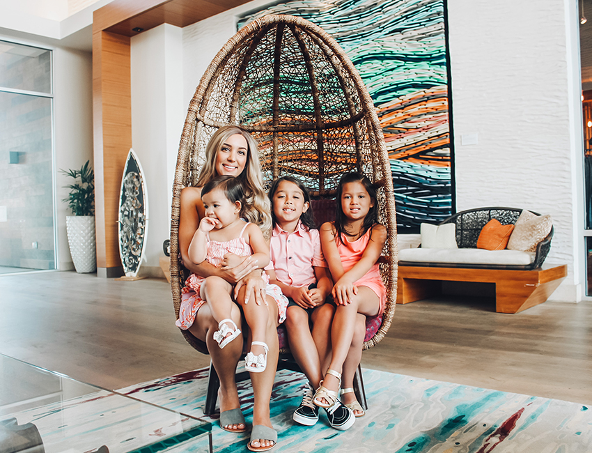 family in pasea lobby chair