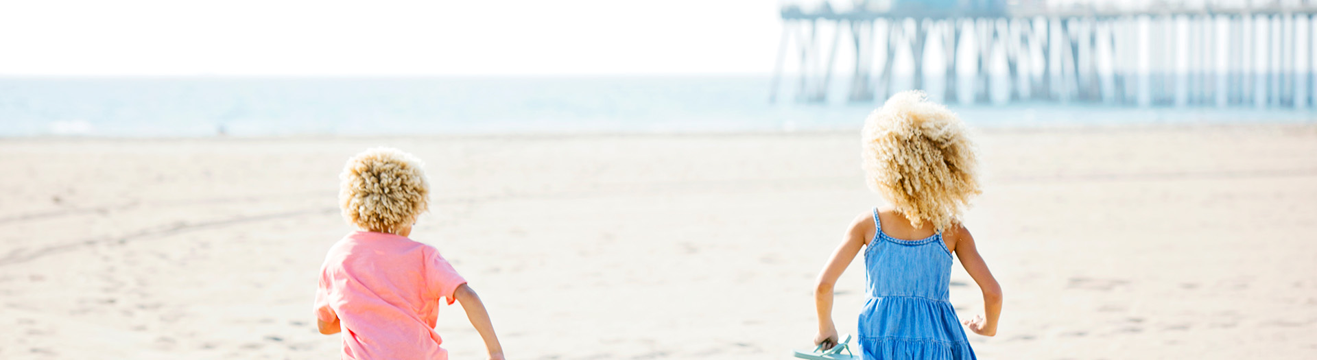 kids running on beach