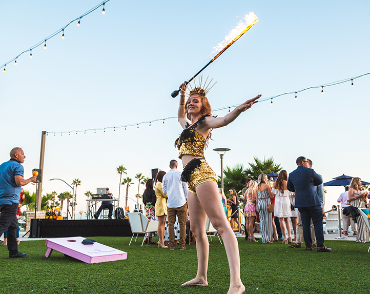 woman on lawn with fire