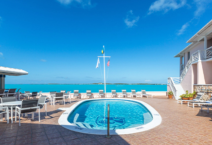 pool with the pool chairs in front