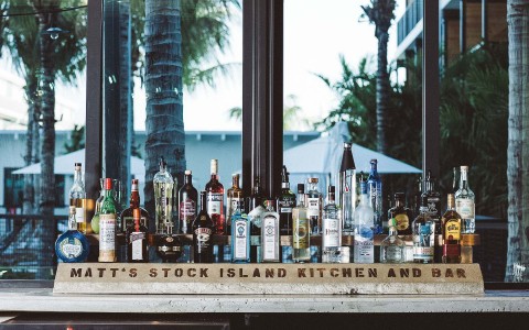 view of different bottles of alcohol at the Stock island bar