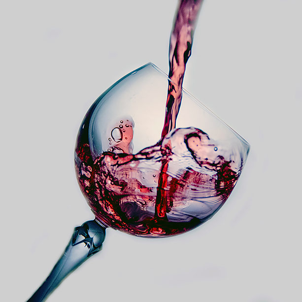 Red wine being poured into glass