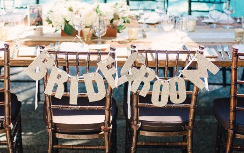 Closeup view of a decorated table for a wedding at the Lower Pool Patio venue