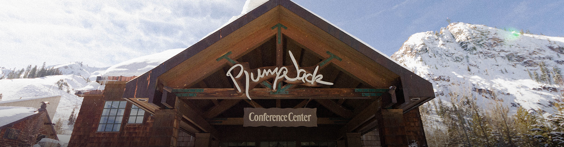 a shoot of the logo on top of the entrance for the conference center at plumpjack inn