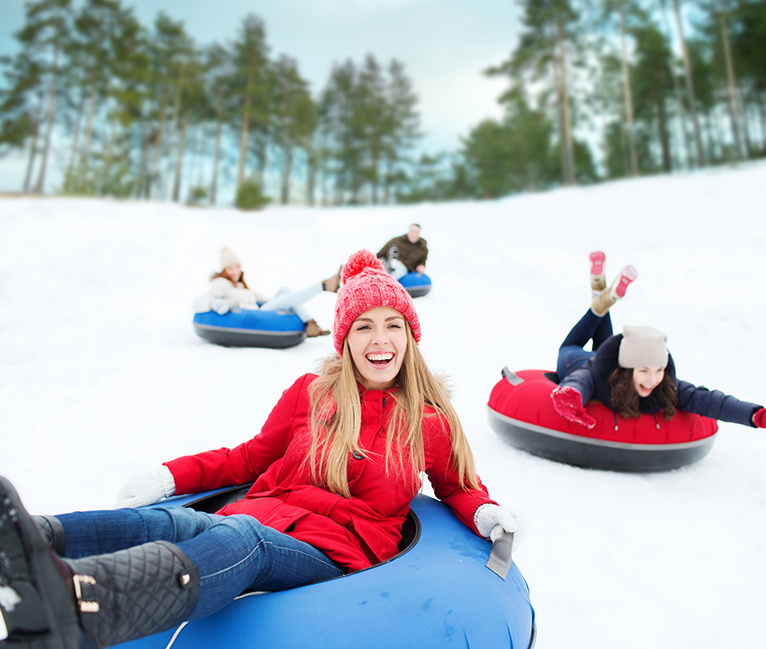 Some happy ladies on a snow tubing